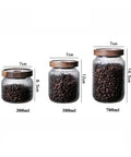Keep Your Stash Fresh With These Top Notch Sealed Tea Canisters And Coffee Bean Jars Crafted From Durable Glass Super Simple Kitchen Pantry Storage Essentials That Are Actually Worth The Buy Hella Convenient: three sizes of sealed glass jars filled with coffee beans.