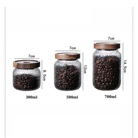 Keep Your Stash Fresh With These Top Notch Sealed Tea Canisters And Coffee Bean Jars Crafted From Durable Glass Super Simple Kitchen Pantry Storage Essentials That Are Actually Worth The Buy Hella Convenient: three sizes of sealed glass jars filled with coffee beans.