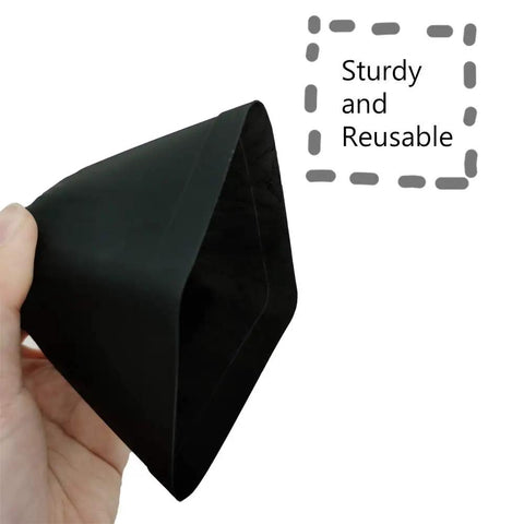Hand holding flexible black pot from 24 Pack 3 Inch Black Square Plastic Plant Pots With Saucers For Indoor And Outdoor Use Durable Reusable Nursery