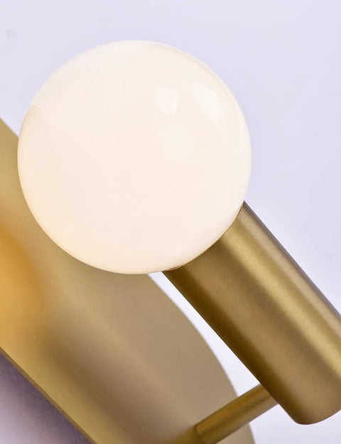 Close-up of Two Pack Brushed Gold Oval Wall Sconces Modern Mid Century Vanity Lights For Bathroom Mirror And Living Room Hallway Dope Minimalist Design With Concealed Lamp Base And Thick Solid Back Plate showing the detailed lamp base.