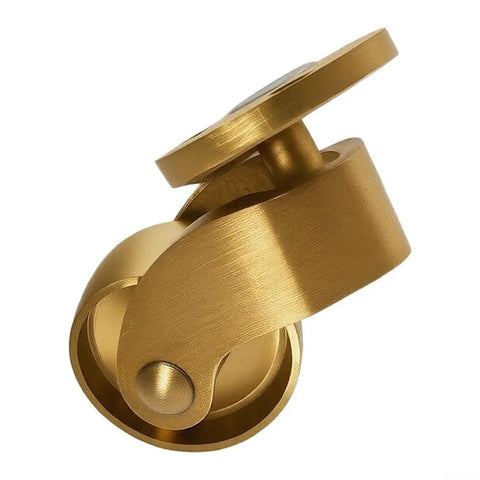 Close-up of a heavy duty brass caster wheel showing smooth rolling hardware for furniture moves.