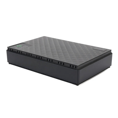 Plug And Play 10400mAh Ups Battery Backup For Routers And Modems in a black compact design with textured surface.