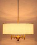 4 Light Gold Modern Drum Chandelier With White Linen Shade 17.7 Inch Pendant Light Fixture For Dining Room Living Room Foyer Kitchen Antique Brass Finish A True Statement Piece hanging on a rod