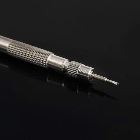Close-up of a textured metal spring bar tool from Pro Grade Spring Bar Tool Set For Watch Bands With 6 Extra Tips And 72 Pins, Repair Kit
