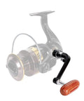 Premium Metal Folding Fishing Reel Handle Kit With Rocking Arm And Hardwood Knob Auto Fold Design For Compact Storage Fits 1000-4000 And 5000-6000 Models Secure Grip Perfect Upgrade For Serious Anglers black metal reel handle with hardwood knob shown installed on spinning reel