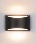 Modern Indoor Wall Sconce Light Up And Down Mount With 9W LED G9 Bulbs Included Warm White 3000K illuminating a wall surface