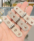 Hand holding metal 180 degree foldable hinge for DIY projects, suitable for wooden boxes and cabinet doors, rust resistant, heavy duty.