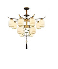 Sharp Chinese Style Crystal Ceiling Fan Chandelier For Living Room with gold accents and glass shades, illuminated decorative ceiling fixture.
