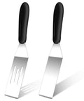 Front view: Two small stainless steel spatulas with black handles; left slotted, right solid blade.