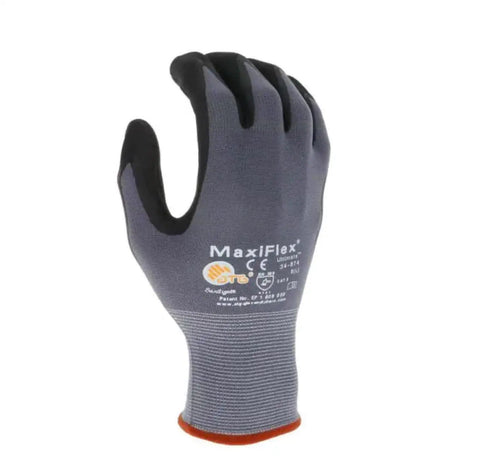 Ultimate Nylon Micro Foam Nitrile Grip Gloves For Heavy Duty Work Tough As Nails Breathable Powder Free Reusable Construction Gloves In Black And Gray 12 Pairs Per Pack For Construction And Industrial Use close-up of single gray glove with black grip