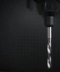 Close-up of PCB Micro Drill Bit Set 0.5mm To 2.3mm Tungsten Carbide Jewelry Drill Bits in a black drill chuck