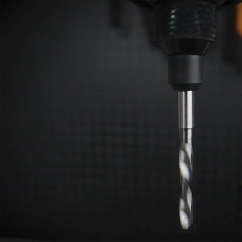 Close-up of PCB Micro Drill Bit Set 0.5mm To 2.3mm Tungsten Carbide Jewelry Drill Bits in a black drill chuck