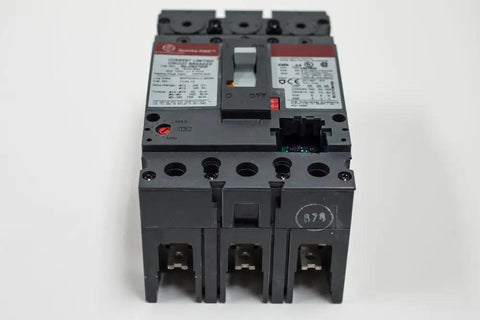 Tough As Nails Three Pole Circuit Breaker Rated 100 Amps At 600 Volt AC Featuring Electronic Solid State Trip Technology front view with labels.