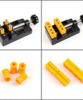 Mini Flat Clamp Bench Vise for Watch Repair and Jewelry DIY with orange jaws and parts, clamps 0 to 2.1 inches, ideal for precision work