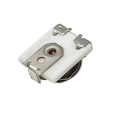 Pack Of Ten SMD Trimmer Potentiometers 10K Ohm Adjustable Resistors Featuring Slick Surface Mount Layout For Dead On Calibration And Smooth PCB Board Tuning close-up of metal trimmer potentiometer with white body and mounting clips.