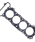 Snag This Slick Heavy Duty Multi Layer Steel Cylinder Head Gasket Built Tough To Beat Rust And Blowouts Fits Honda CB900F CB919 CBR900RR CBR919RR 1996 To 2007 angled view of gasket