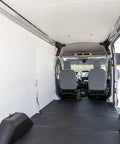 Interior view of Mercedes Sprinter with gray polypropylene wall liner, showcasing fitment and insulation for 170Wb.