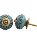 One Hundred Count Super Snazzy Green Ceramic Drawer Pulls Featuring Etched Vintage Vibes For Kitchen Cabinets And Bedroom Dressers Totally Slick Rust Free Home Upgrade Gear, round knobs with golden screws.