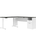 Heavy Hitter L Shaped Electric Standing Desk With Pretty Dang Smooth Motorized Lift And Scratch Resistant Deep Grey Top in white finish