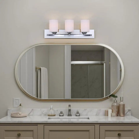 Slick Chrome Hampton 3 Light Vanity with Flat Opal Glass damp location rated bathroom light 24 inch fixture above mirror