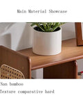 Expandable Bamboo Bookshelf Organizer For Your Home Office with plant on wooden surface showcasing material