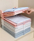 Slick Setup Folding Clothes Organizer Set For Quick T Shirt Folder Board With Stackable Clothing Dividers Stress Free Drawer Closet Storage For Zero Wrinkles And Easy Laundry with stacked shirts.
