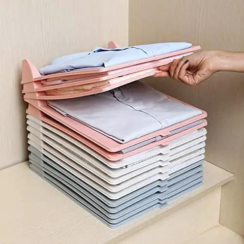 Slick Setup Folding Clothes Organizer Set For Quick T Shirt Folder Board With Stackable Clothing Dividers Stress Free Drawer Closet Storage For Zero Wrinkles And Easy Laundry with stacked shirts.