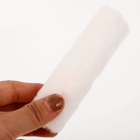 Kickass Fifteen Piece Mini Paint Roller Kit With Four Inch Round Heads And An Extension Pole Premium cotton cover held in hand.