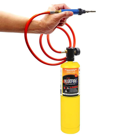 Hand holding MAP And MAPP Gas Soldering Mini Pen Torch Kit With 3 Foot Hose 6 Replaceable Heads Piezo Igniter Free Flint Lighter Storage Box