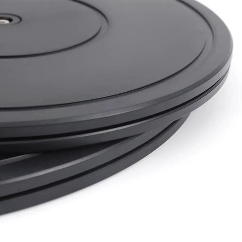 Close-up of black rotating lazy susan turntable with ball bearing swivel 360 degree kitchen cabinet organizer for spices cosmetics and DIY crafts