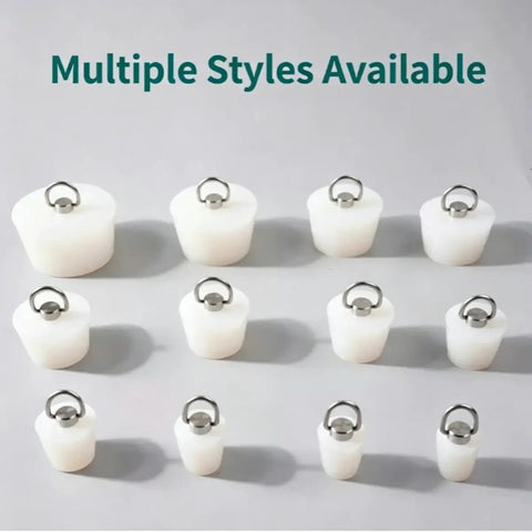 Various Silicone Drain Stoppers with Pull Rings arranged in multiple styles, showcasing flexible silicone material.