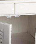 Push To Open Cabinet Latch Set Stainless Steel Magnetic Catch for kitchen cabinets installed inside a white cabinet door
