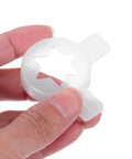 Hand holding Six Point Star Ice Cream Nozzle Replacement For Soft Serve Machines Hexagon Shaping Tip Pro Grade Universal Accessory