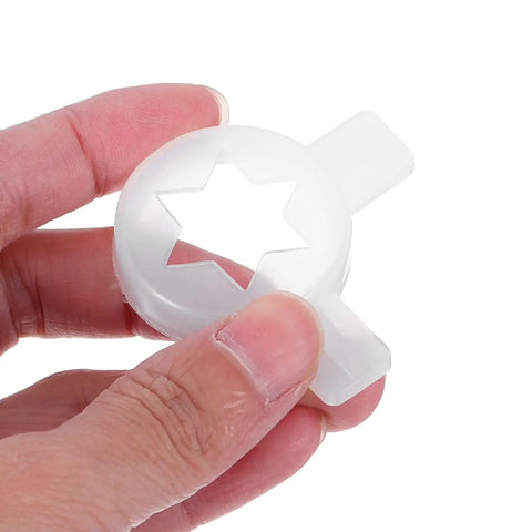 Hand holding Six Point Star Ice Cream Nozzle Replacement For Soft Serve Machines Hexagon Shaping Tip Pro Grade Universal Accessory
