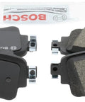 Bosch QuietCast ceramic rear brake pad set for Audi, front and back views.