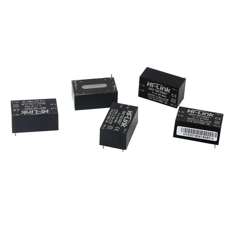 Five Pack AC To DC 220V 3.3V Isolated Buck Power Supply Module Step Down Converter For Household Switches Includes Overload And Short Circuit Protection Low No Load Loss The Go To DIY Power Upgrade modules arranged on a surface