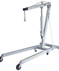 Pro Grade Folding Shop Crane And Engine Hoist With 4000 Pound Capacity in silver, designed for heavy lifting with foldable legs.
