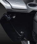 Black Titanium Handlebar Clamp Bolts And Brake Clutch Perch Screws attached to a motorcycle frame for secure mounting.