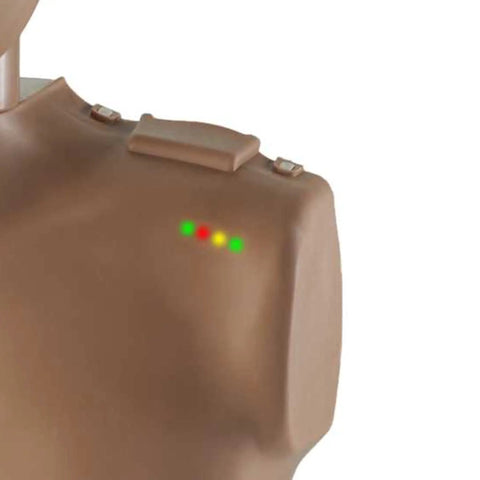 Level Up Your First Aid Game With This Legit Pro Adult CPR Training Manikin In Medium Skin Tone Featuring Real Time Chest Feedback Lightweight Carry Bag And Ten Extra Face Shields Included, showing feedback lights on the shoulder.