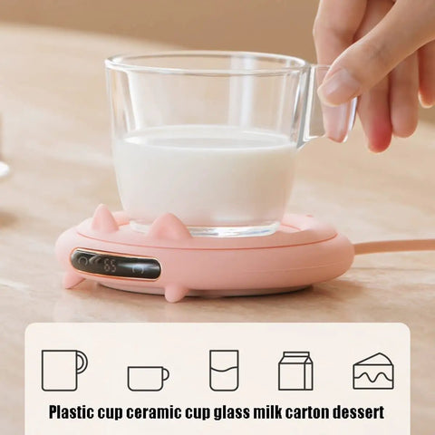 Smart Coffee Mug Warmer With Digital Display And Three Heat Settings Touch Switch Electric Cup Heating Pad To Keep Your Daily Brew Nice And Toasty Ultimate Winter Gift Beige with a glass cup on a pink heating pad.