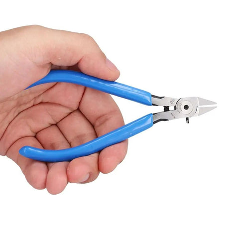 Hand holding Beefy Diagonal Wire Cutter Pliers With Rebound Spring for easy one hand cuts, precision sharp edges for electricians and DIY enthusiasts.