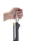 Ultimate Loading And Cleaning Rod For Guns Range Ready Cleaning Tool in use, demonstrating sturdy and durable handle grip