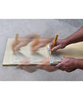 Professional Aluminum Rafter Square 7 Inch With CNC Edges For Dead On Angles in use as saw guide on wood surface