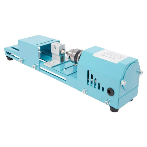 Mini Wood Lathe for Desktop Use with 7 Speed Settings 96W Motor Up to 9000 RPM, turquoise body and metal chuck for precision cutting.