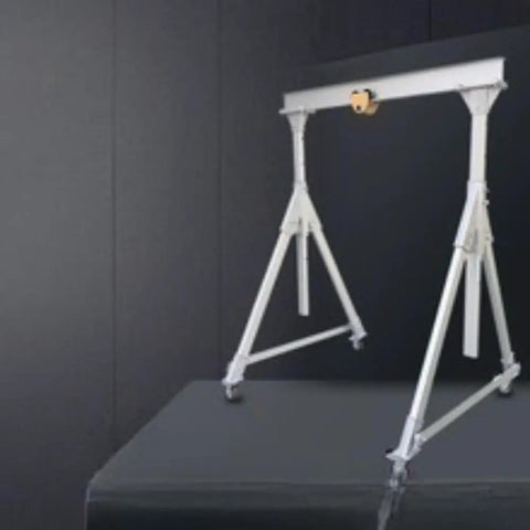 Real Deal Portable Gantry Crane With Electric Winch And Chain Ratchet, adjustable aluminum frame on wheels for easy material handling.