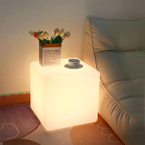 15 Inch RGB LED Cube Light With Remote Color Changing Cubes For Seating Tables Nightstands Lit Mood Lighting Waterproof Glow Furniture For Home Garden Parties And More used as a glowing side table in a living room