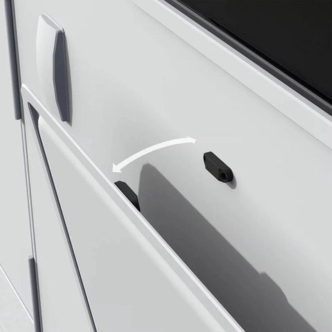 RV baggage door holder latch installed on a white RV, showing its use to keep doors open. Durable plastic and metal construction.