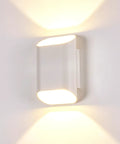 VOOOV 7.9 Inch White LED Wall Sconce Includes 5CCT Dimmable Lighting mounted on wall, casting warm light.
