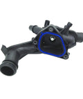 Direct Fit Coolant Thermostat Housing Assembly Replacement Fits Peugeot 2008 And 207 Engine Cooling Systems, black plastic with blue gasket.