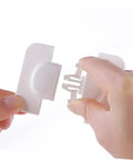 Hands showing the mechanism of Six Pack Easy Install Kid Safe Locks For Cabinets Drawers And Refrigerators White Durable Latches For Home Use.